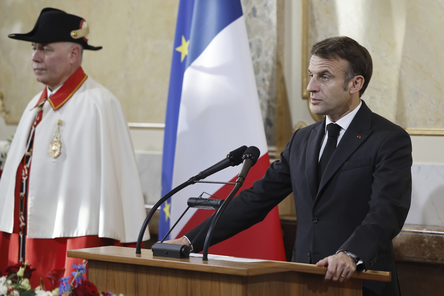 French President Emanuel Macron speaks during the official discourse in the Federal Palace, the Swiss Parliament building, in Bern, Switzerland, Wednesday, Nov. 15, 2023. French President Emmanuel Mac ...