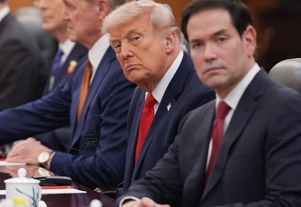 President Donald Trump meets with China's President Xi Jinping at the Great Hall of the People, Thursday, May 14, 2026, in Beijing, as Secretary of State Marco Rubio watches. (AP Photo/Mark Schie ...