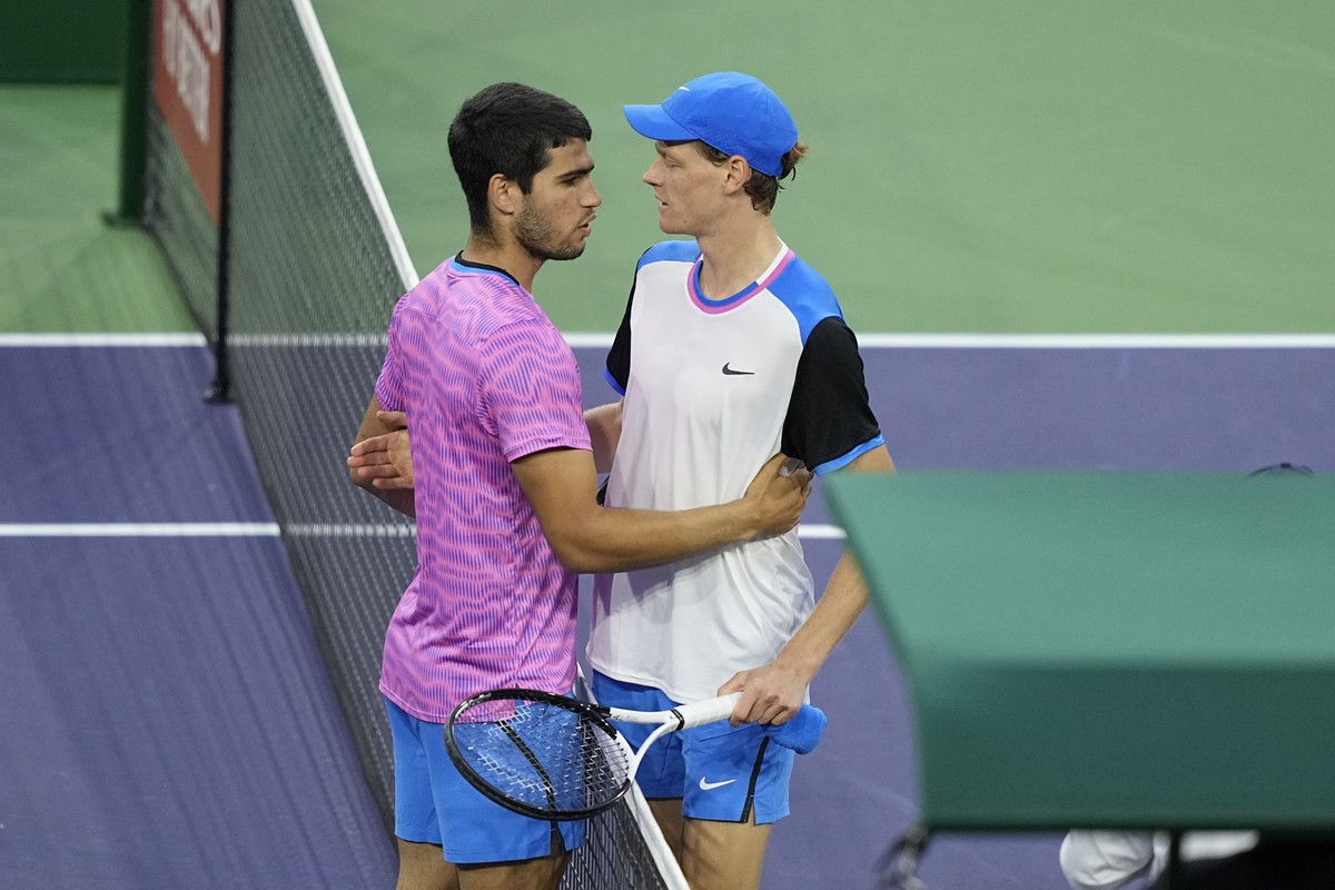 Carlos Alcaraz, of Spain, left, embraces Jannik Sinner, of Italy, after defeating him in a semifinal match at the BNP Paribas Open tennis tournament, Saturday, March 16, 2024, in Indian Wells, Calif.  ...