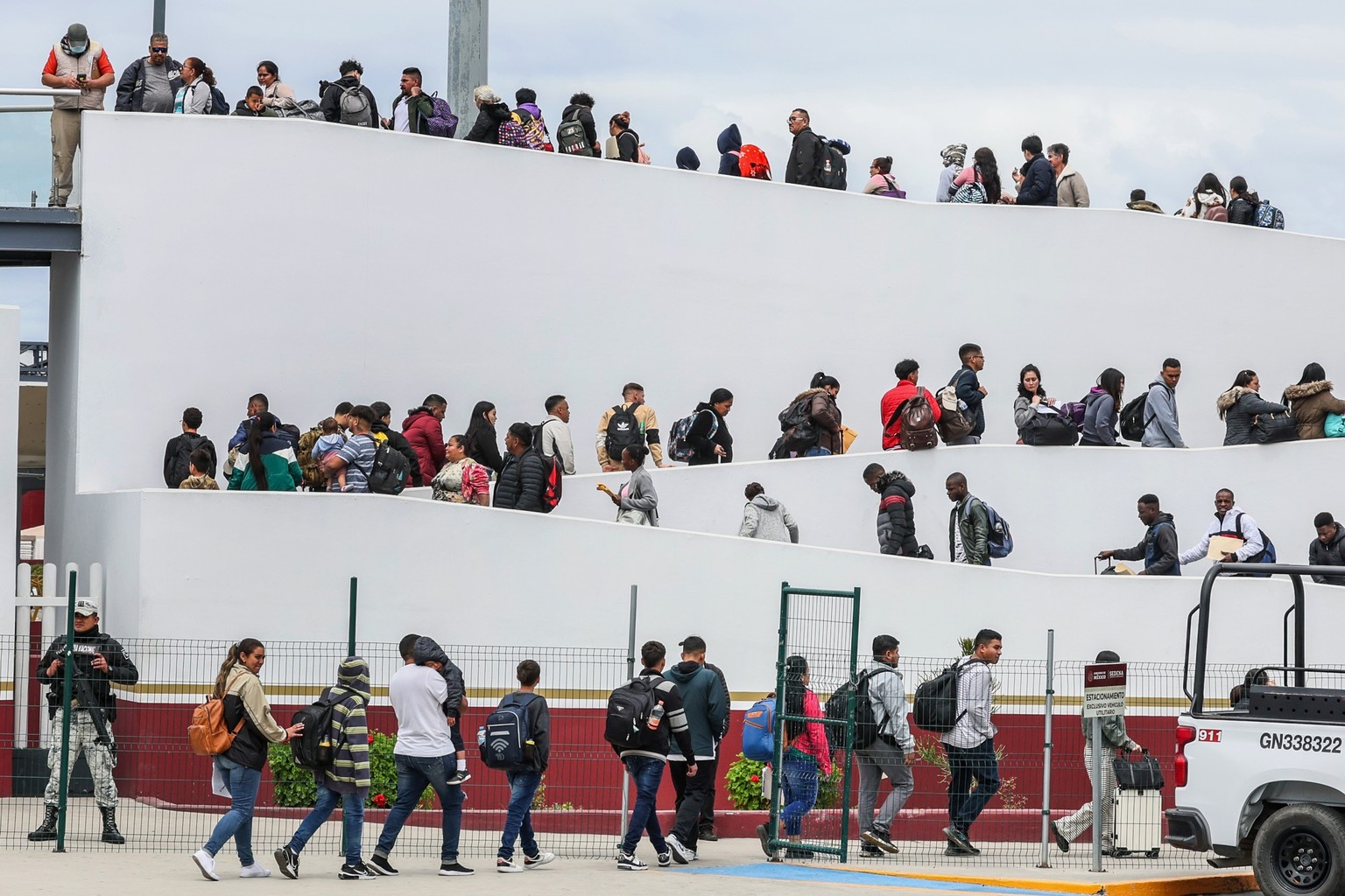 Tijuana, Mexico, Thursday, April 25, 2024 - Hundreds of asylum seekers who used a CBP phone app to make an appointment, are led to their interviews with U.S. customs agents at the San Ysidro Border Cr ...