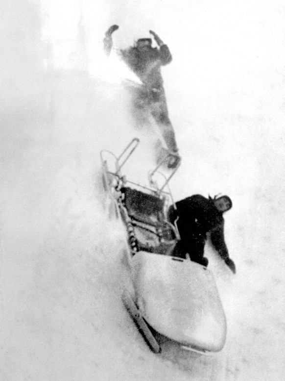 Alfonso de Portago Spanish aristocrats Cabeza de Vaca left and Alfonso de Portago take a spill without injury as their two man bob-sleigh goes haywire during training at the Cortina Olympic track in I ...