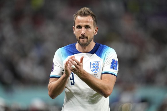 England's Harry Kane acknowledges the applause from the crowd during the World Cup group B soccer match between England and Iran at the Khalifa International Stadium in Doha, Qatar, Monday, Nov. 21, 2 ...