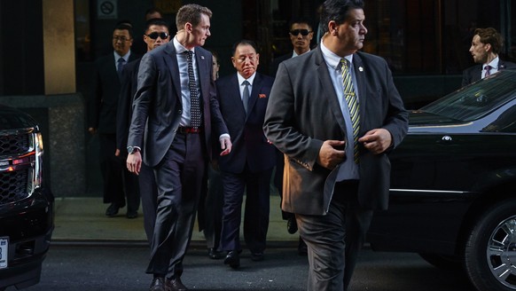 North Korea&#039;s Kim Yong Chol, center, leaves a hotel in New York, Wednesday, May 30, 2018. The senior North Korean official arrived in New York on Wednesday in the highest-level official visit to  ...