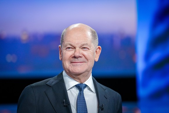 epa11901903 Incumbent German Chancellor Olaf Scholz, chancellor candidate for the Social Democratic Party (SPD), takes part in the TV debate &#039;Quadrell&#039; on the German federal election campaig ...