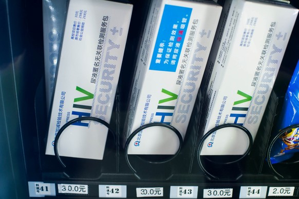 HIV testing kits are seen in a vending machine in a university in Chengdu, Sichuan Province, China, November 27, 2016. Picture taken November 27, 2016. REUTERS/Stringer ATTENTION EDITORS - THIS IMAGE  ...