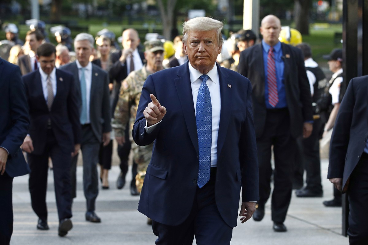 President Donald Trump returns to the White House after visiting outside St. John's Church, Monday, June 1, 2020, in Washington. Part of the church was set on fire during protests on Sunday night ...