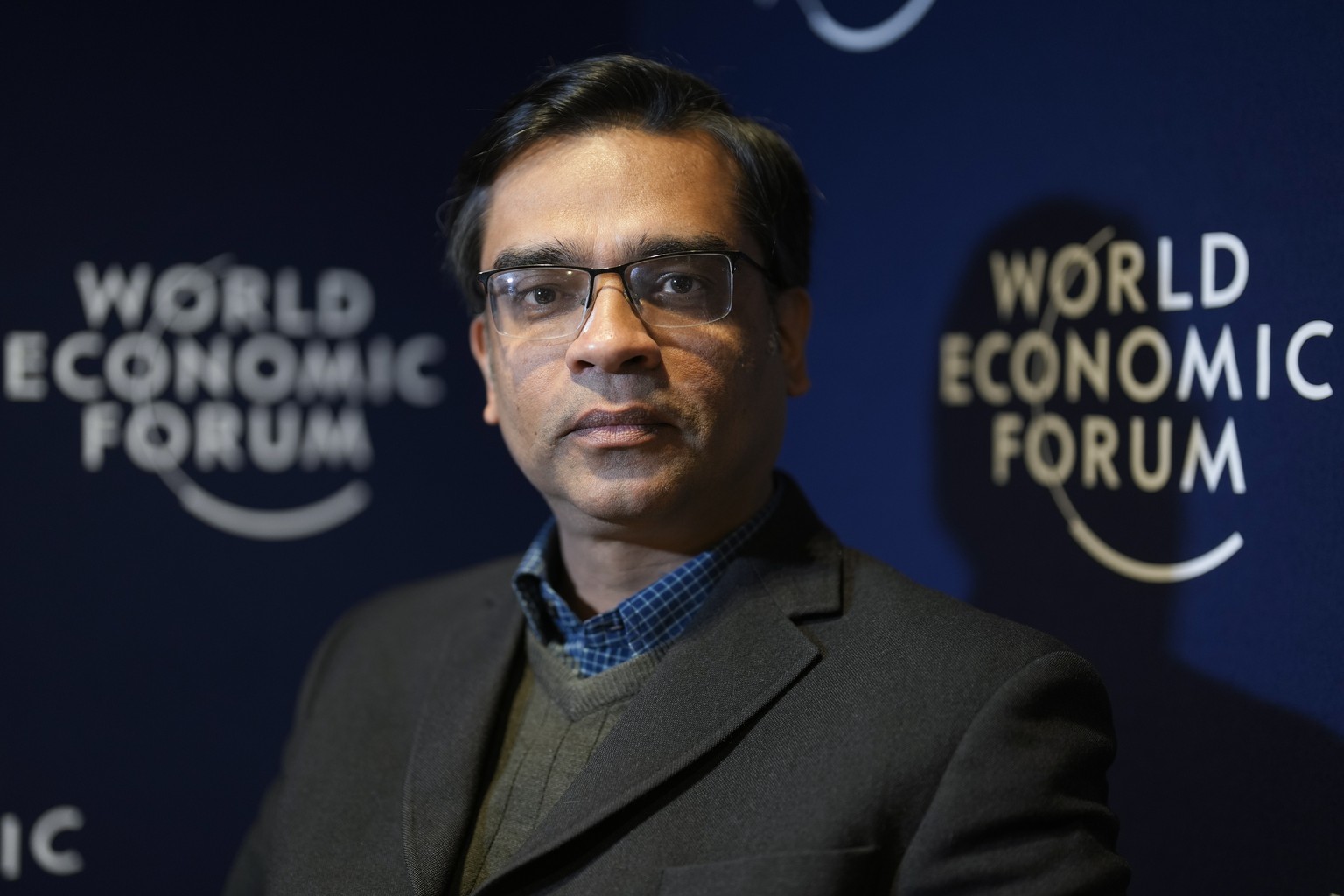 Amitabh Behar, executive director of Oxfam International poses for a photo after an interview with The Associated Press ahead of the Annual Meeting of the World Economy Forum in Davos, Switzerland, Su ...