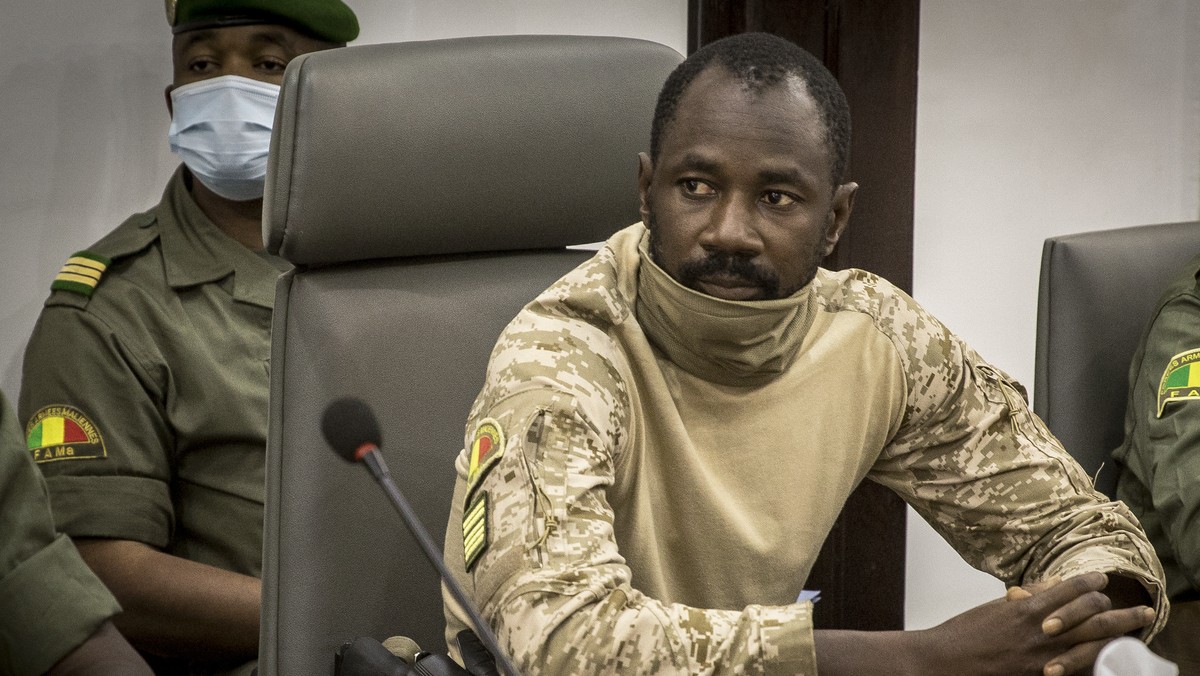 FILE - Col. Assimi Goita meets with a high-level delegation from the West African regional bloc known as ECOWAS, at the Ministry of Defense in Bamako, Mali on Aug. 22, 2020. Malian authorities have ar ...