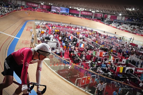 Thery Schir of Team Switzerland competes during the track cycling men&#039;s omnium points race at the 2020 Summer Olympics, Thursday, Aug. 5, 2021, in Izu, Japan. (AP Photo/Christophe Ena)