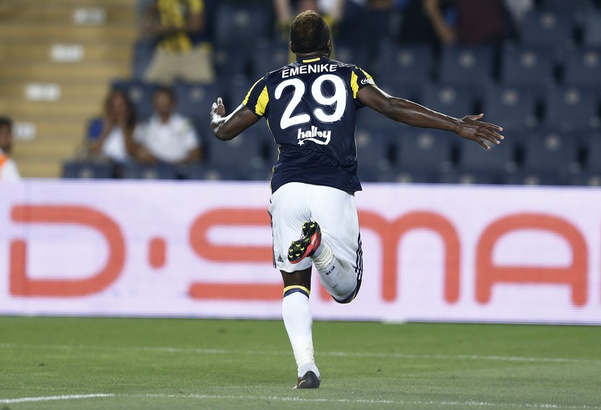 epa05444061 Fenerbahce&#039;s Emmanuel Emenike celebrates his goal during the UEFA Champions League third qualifying soccer match between Fenerbahce vs AS Monaco at Sukru Saracolu stadium in Istanbul, ...