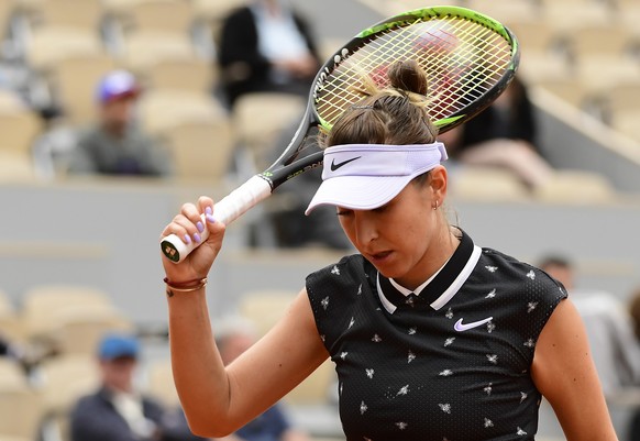 epa07610770 Belinda Bencic of Switzerland plays Laura Siegemund of Germany during their womenâs second round match during the French Open tennis tournament at Roland Garros in Paris, France, 29 May  ...