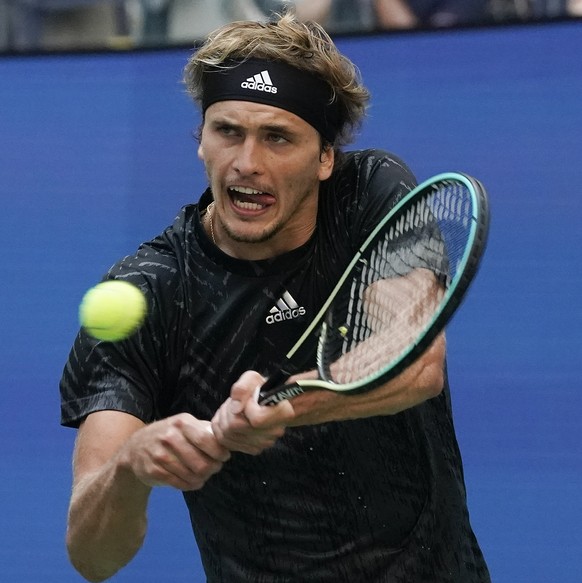Alexander Zverev, of Germany, returns a shot to Lloyd Harris, of South Africa, during the quarterfinals of the US Open tennis championships, Wednesday, Sept. 8, 2021, in New York. (AP Photo/Elise Amen ...