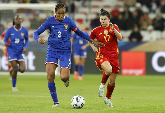 epa11755511 Wendie Renard (L) of France and Lucia Garcia (R) of Spain in action during the Women&#039;s international friendly soccer match between France and Spain in Nice, France, 03 December 2024.  ...