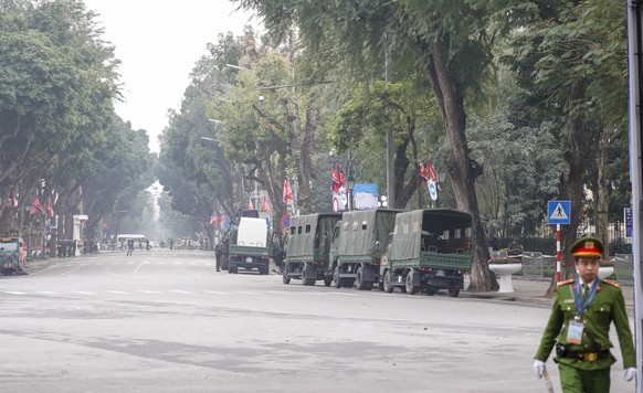 epa07400290 A police officer walks past the blocked road in front of Sofitel Legend Metropole Hanoi hotel where US President Donald J. Trump and North Korean leader Kim Jong-un are scheduled to meet f ...