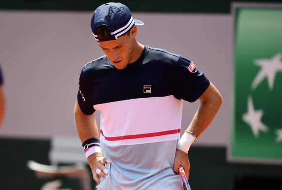 epa06790645 Diego Schwartzman of Argentina reacts as he plays Rafael Nadal of Spain during their menâs quarter final match during the French Open tennis tournament at Roland Garros in Paris, France, ...