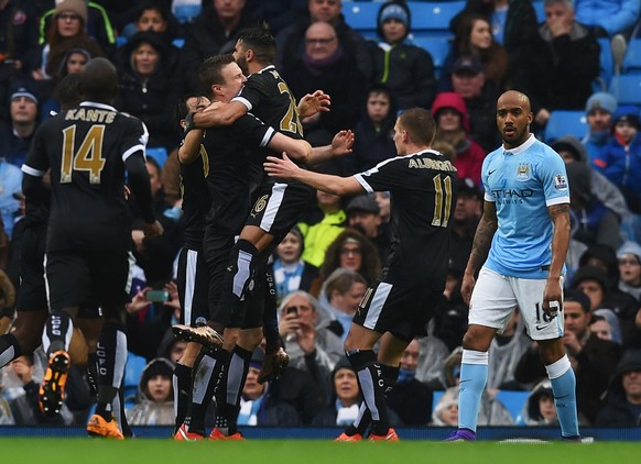 MANCHESTER, ENGLAND - FEBRUARY 06: Robert Huth (4th R) of Leicester City celebrates scoring his team&#039;s first goal with his team mates during the Barclays Premier League match between Manchester C ...