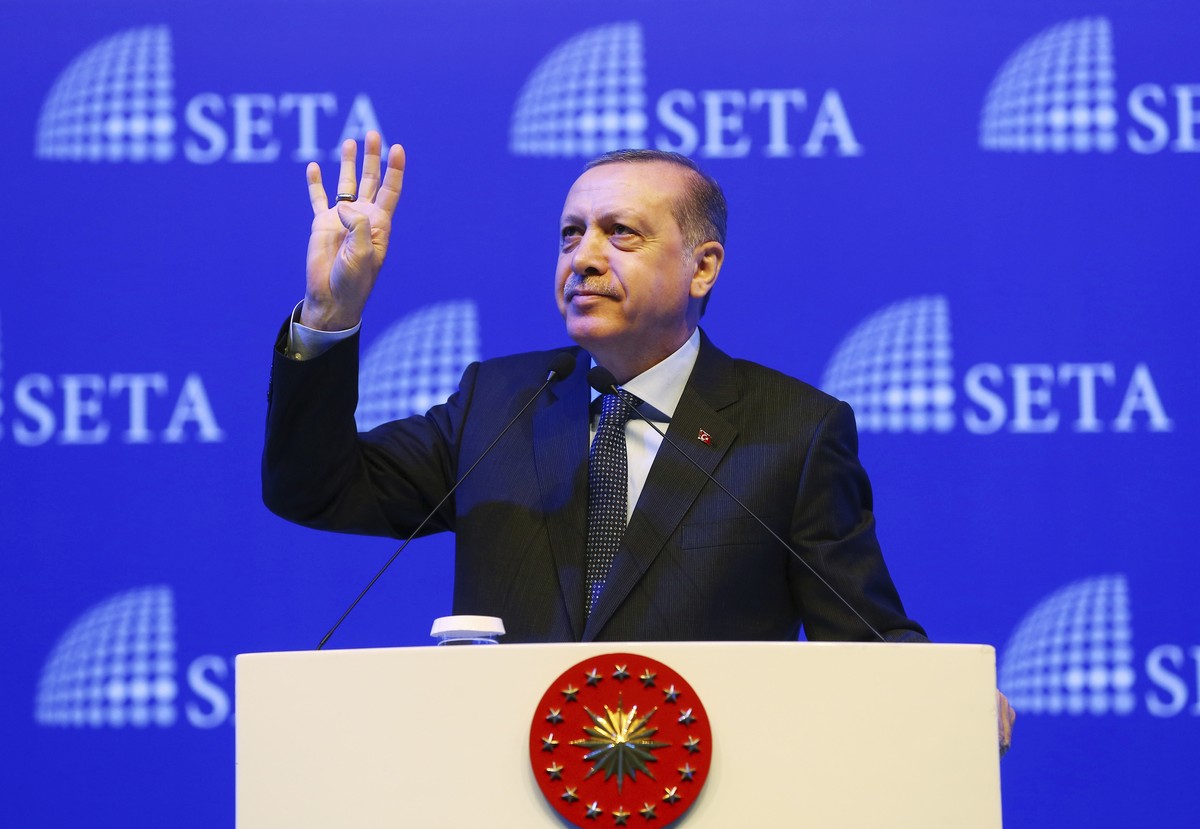 Turkey's President Recep Tayyip Erdogan addresses his supporters in Istanbul, Saturday, Feb. 11, 2017. Turkey's electoral board on Saturday confirmed April 16 as the date of a national refer ...
