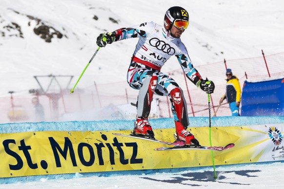 epa05792734 Marcel Hirscher of Austria in action during the round of 16 of the Nations Team Event at the 2017 FIS Alpine Skiing World Championships in St. Moritz, Switzerland, 14 February 2017. EPA/JE ...