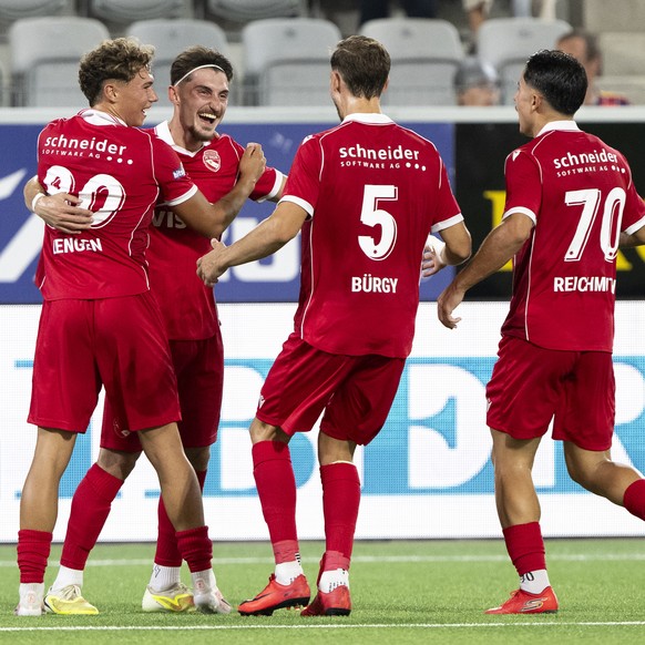 Fabio Saiz (FC Thun), 2nd left, celebrates his goal after scoring the 3-0 with Simon Lengen, Nicolas Buergy, and Nils Reichmuth, from left, during the third qualifying round UEFA Europa League match b ...