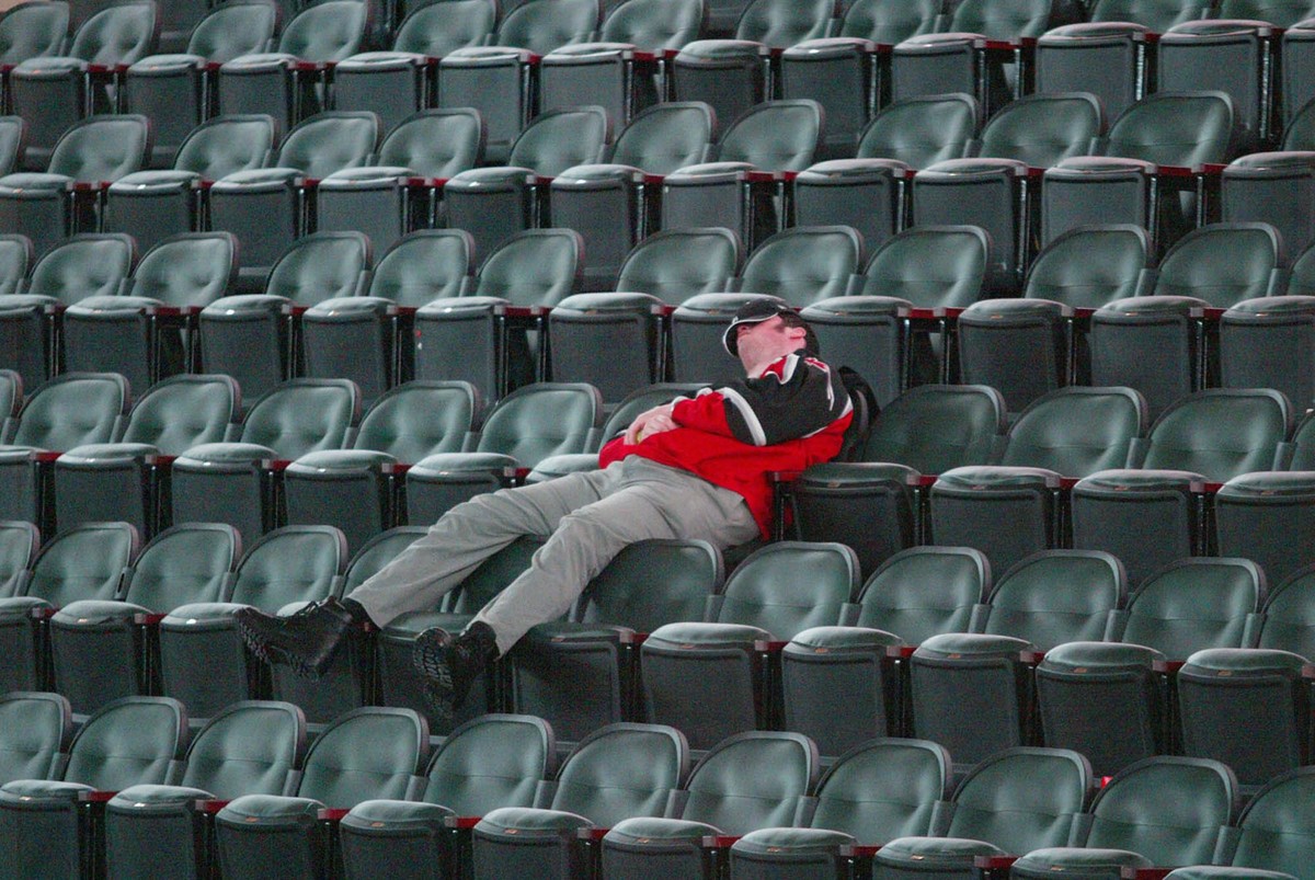 Doran Libin, from Vancover, British Columbia, catches a few winks Saturday, Jan. 1, 2005, between games at the World Junior Hockey Championship at Ralph Engelstad Arena in Grand Forks, N.D. Libin said ...