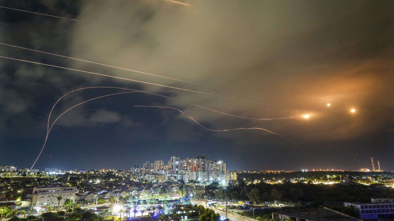 Israeli Iron Dome air defense system fires to intercept a rocket fired from the Gaza Strip, in Ashkelon, Israel, Saturday, Oct. 14, 2023. (AP Photo/Tsafrir Abayov)