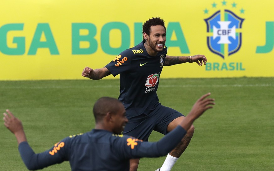 Brazil's soccer player Neymar, warms up during a practice at the Granja Comary training center ahead the Copa America tournament in Teresopolis, Brazil, Saturday, May 25, 2019. (AP Photo/Silvia Izquie ...
