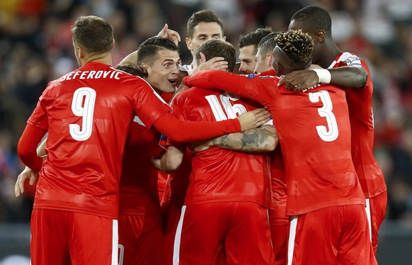 Switzerland&#039;s Steven Zuber, hidden, celebrates with teammates after scoring the 4-0 during the 2018 Fifa World Cup Russia group B qualification soccer match between Switzerland and Hungary in the ...