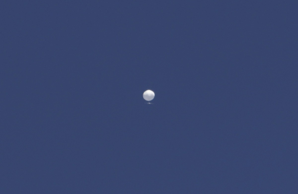 FILE - A balloon floats over Columbia, Mo., on Feb. 3, 2023. The United States on Friday, Feb. 10 blacklisted six Chinese entities it said were linked to Beijing's aerospace programs as part of i ...