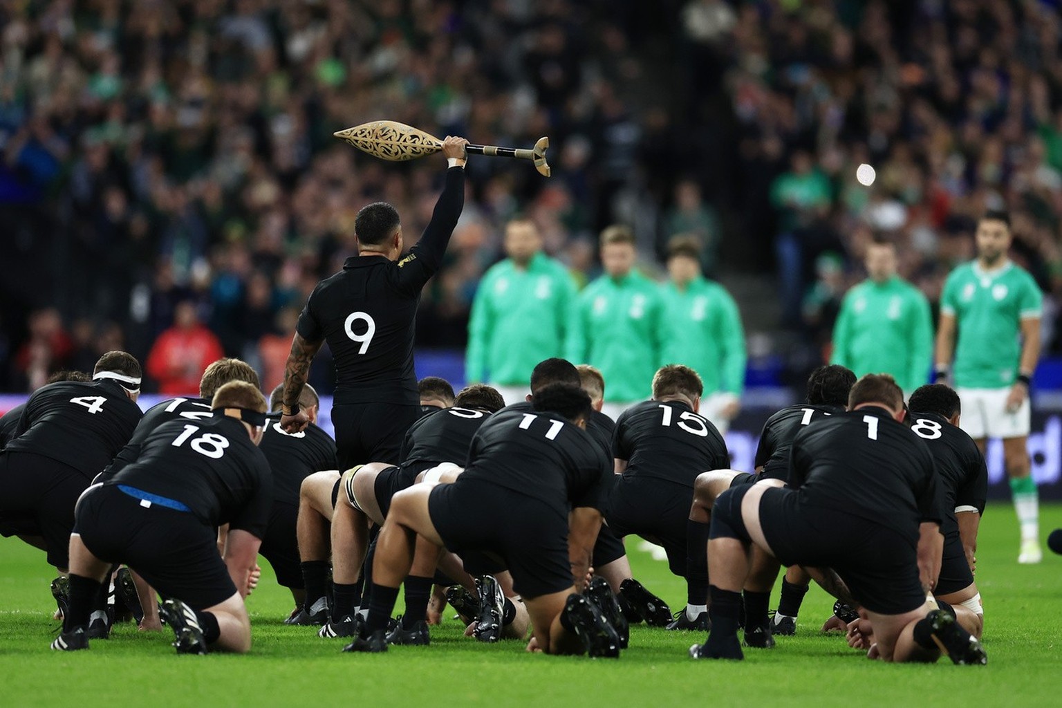 New Zealand&#039;s players perform Haka before the Rugby World Cup quarterfinal match between Ireland and New Zealand at the Stade de France in Saint-Denis, near Paris, Saturday, Oct. 14, 2023. (KEYST ...