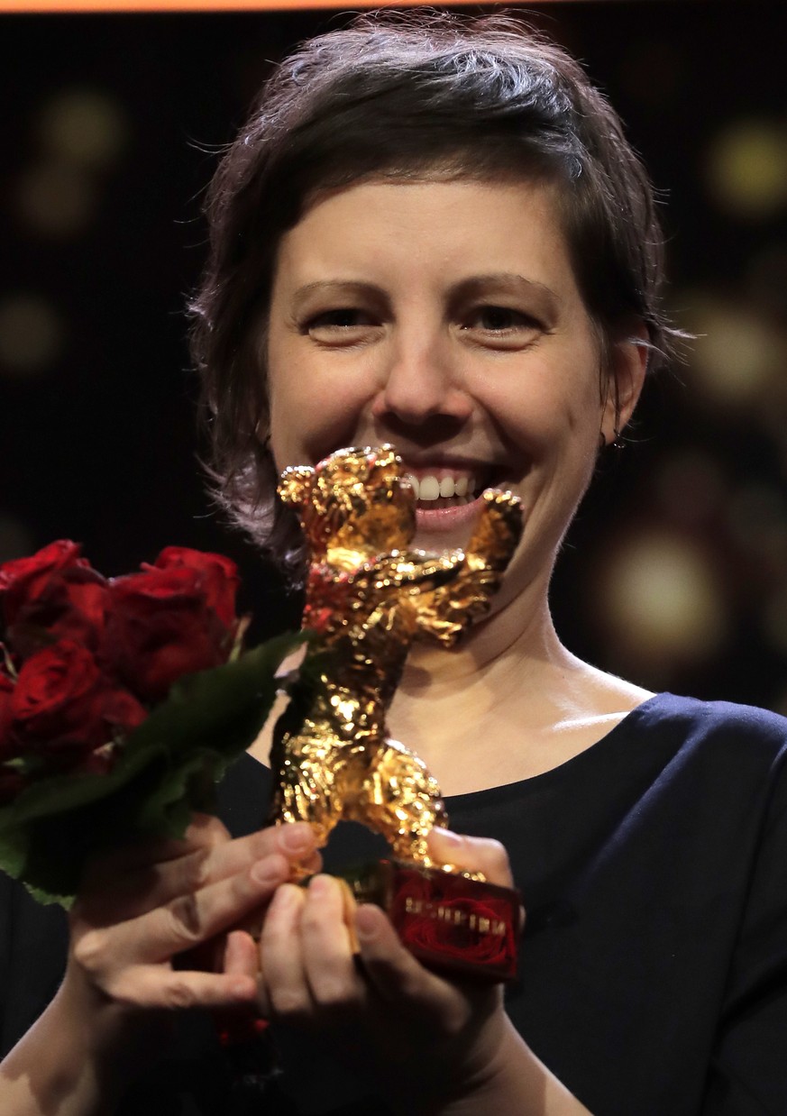 Director and screenwriter Adina Pintilie holds the golden bear for the best movie for her film &#039;Touch me not&#039; during the awarding ceremony of the 68th edition of the International Film Festi ...