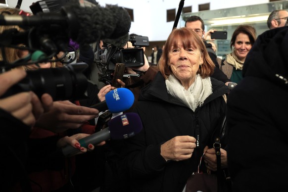 epa11780324 Gisele Pelicot (C) leaves the criminal court where her ex-husband Dominique Pelicot stands trial, in Avignon, South of France, 16 December 2024. Dominique Pelicot is accused of drugging an ...