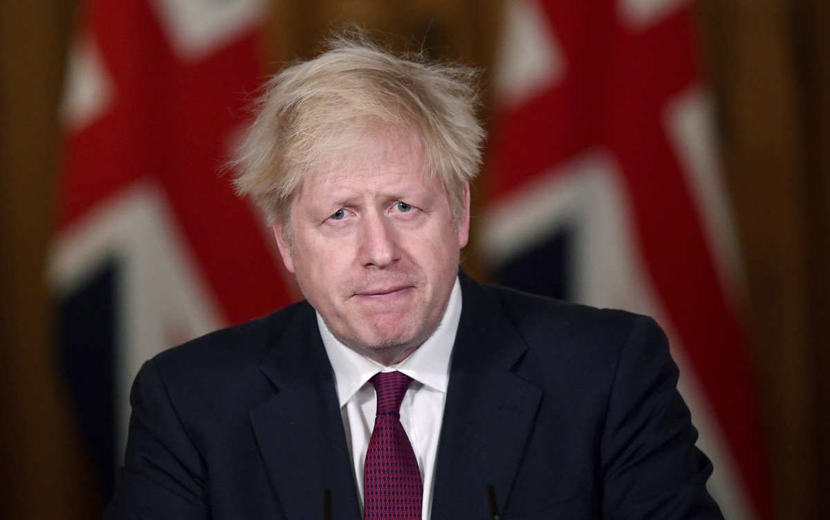 Britain's Prime Minister Boris Johnson speaks during a news conference in response to the ongoing situation with the coronavirus (COVID-19) pandemic, inside 10 Downing Street, London, Saturday, D ...