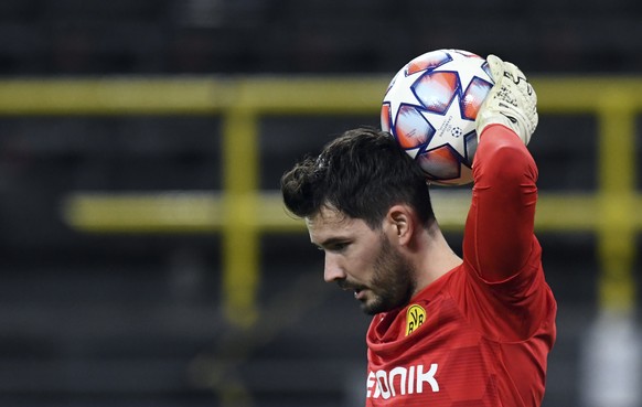 Dortmund goalkeeper Roman Buerki holds the ball during the Champions League group F soccer match between Borussia Dortmund and Zenit Saint Petersburg in Dortmund, Germany, Wednesday, Oct. 28, 2020. (B ...