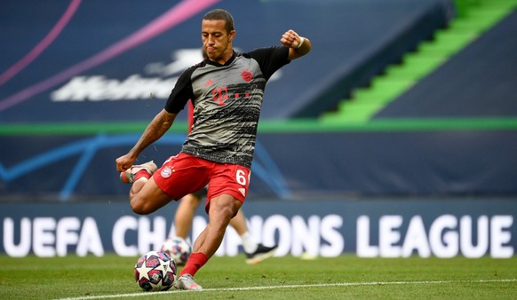 epa08613195 Thiago Alcantara of Bayern Munich warms up prior to the UEFA Champions League semi final match between Olympique Lyon and Bayern Munich in Lisbon, Portugal, 19 August 2020. EPA/Franck Fife ...