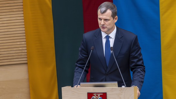 FILE -Lithuania&#039;s Social Democratic party member Gintautas Paluckas, nominated as the next Prime Minister, speaks during a Lithuania&#039;s parliament session in Vilnius, Lithuania, Nov. 21, 2024 ...