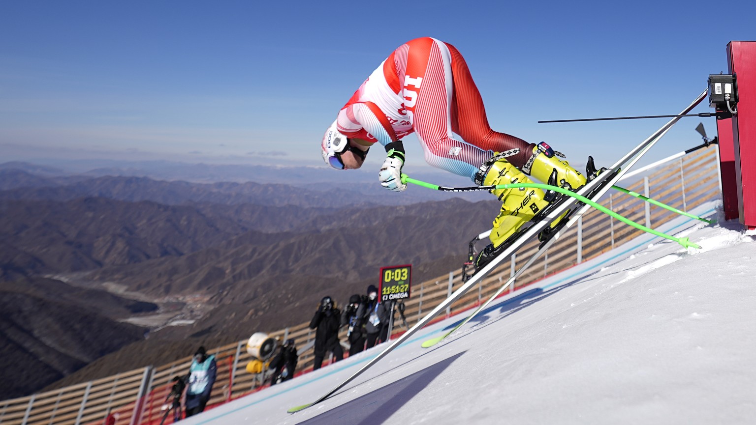 Stefan Rogentin, of Switzerland starts a men&#039;s downhill training run at the 2022 Winter Olympics, Thursday, Feb. 3, 2022, in the Yanqing district of Beijing. (AP Photo/Luca Bruno)