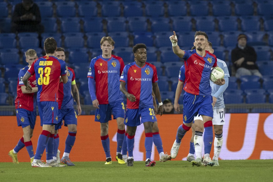 Basel&#039;s Andi Zeqiri, right, cheers after scoring during the UEFA Conference League round of 16 first leg match between Switzerland&#039;s FC Basel 1893 and Slovakia&#039;s SK Slovan Bratislava at ...