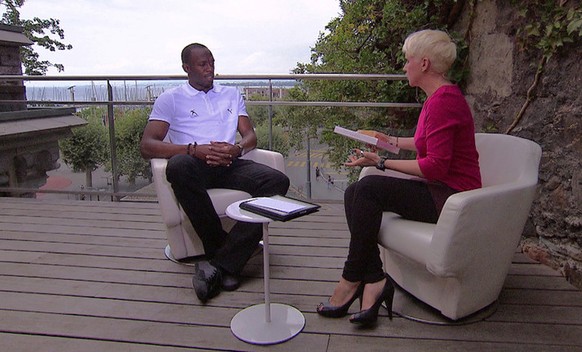 Steffi Buchli plaudert mit Supersprinter Usain Bolt.