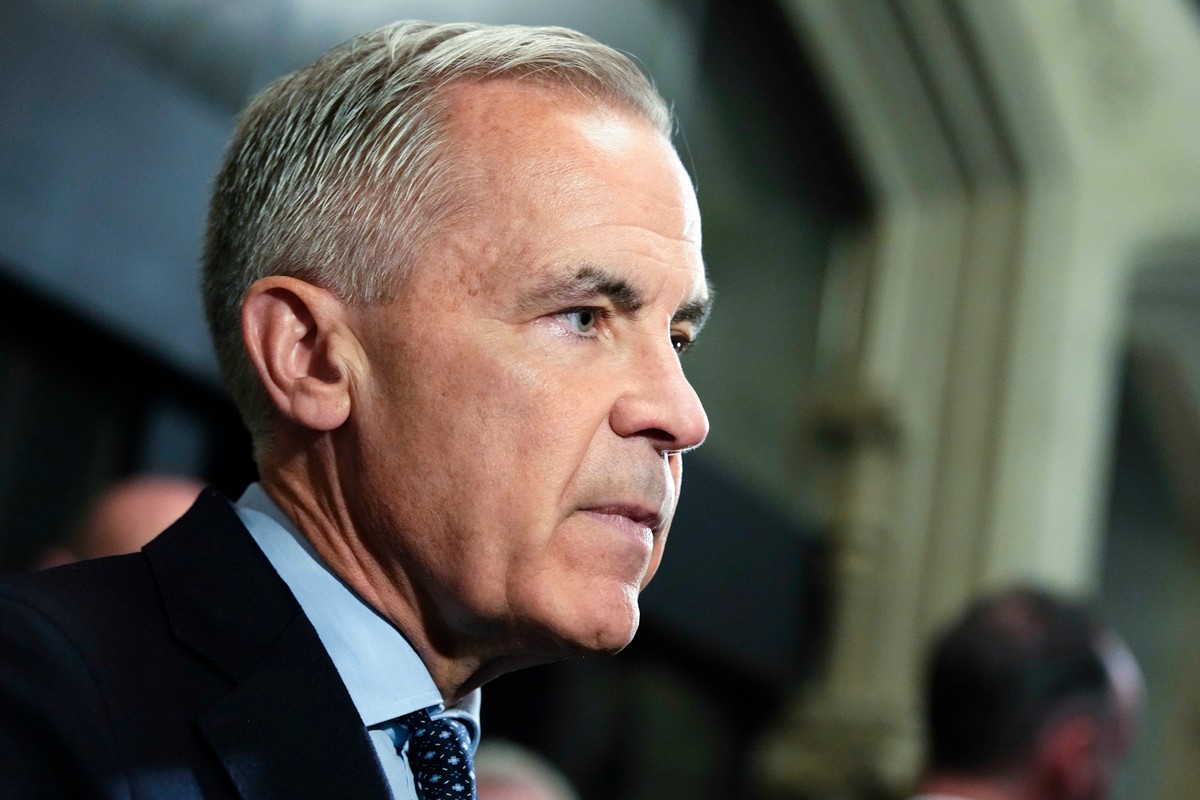 Prime Minister Mark Carney responds to questions from journalists as he makes his way to a meeting of the Liberal caucus, on Parliament Hill in Ottawa, on Wednesday, Oct. 7, 2026. (Justin Tang/The Can ...
