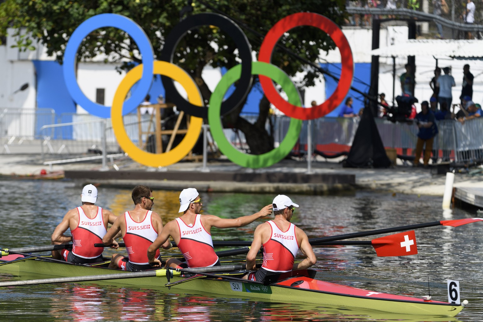 From left, Lucas Tramer, Simon Schuerch, Simon Niepmann and Mario Gyr of Switzerland react after the men&#039;s Lightweight Four Semifinal at the Lagoa Stadium in Rio de Janeiro, Brazil, at the Rio 20 ...