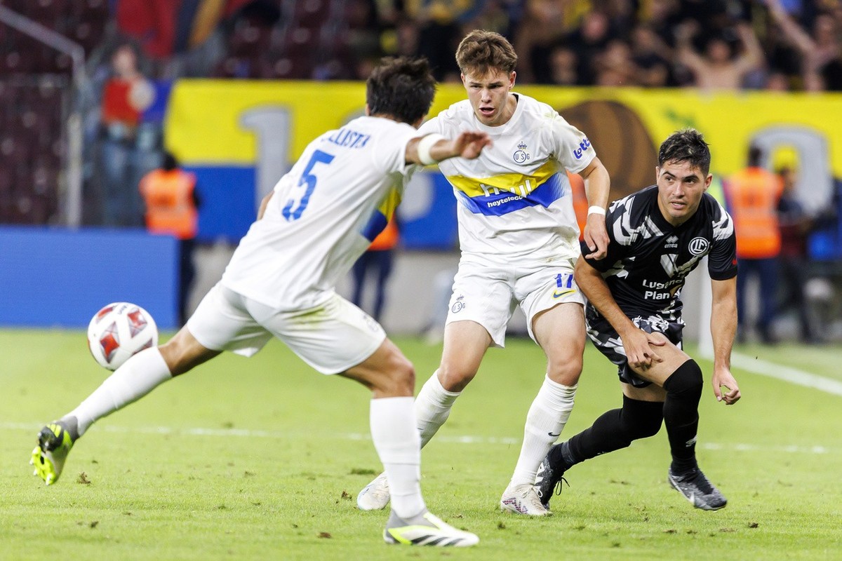 Lugano's forward Ignacio Aliseda, right, fights for the ball with Union Saint-Gilloise's midfielder Casper Terho, centre, past Union Saint-Gilloise's defender Kevin Mac Allister, left,  ...
