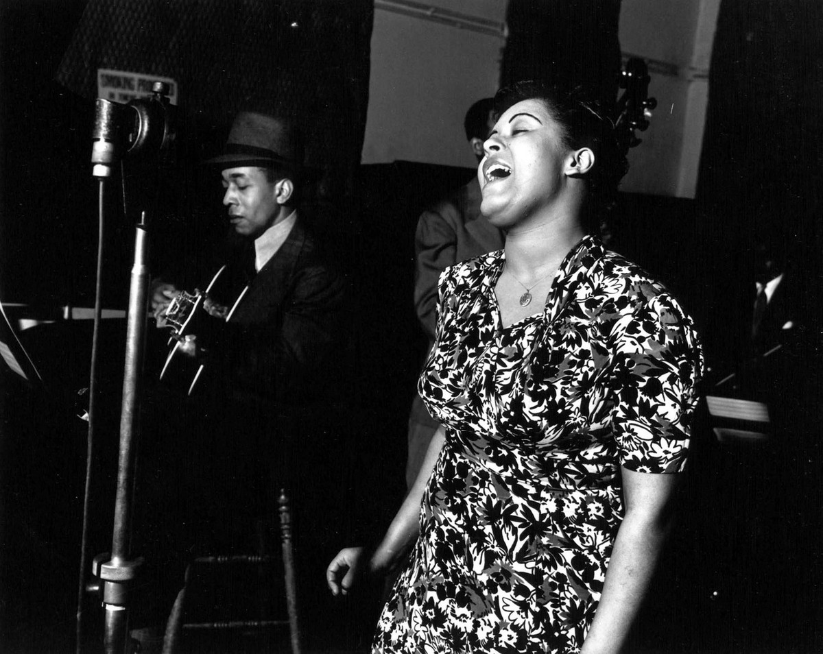 Jazz singer Billie Holiday sings "Strange Fruit" during a recording session in this April 20, 1939 photo. The song composed by Abel Meeropol, which is about Southern lynchings of blacks, is  ...