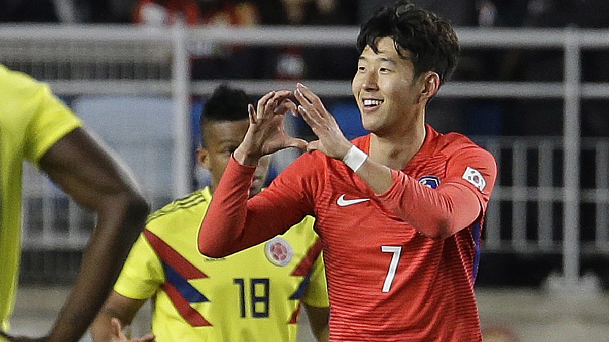 South Korea' Son Heung-min, right, celebrates after scoring a goal against Colombia during a friendly soccer match at Suwon World Cup Stadium in Suwon, South Korea, Friday, Nov. 10, 2017. (AP Pho ...