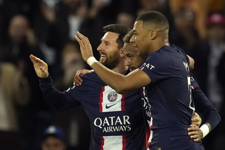 PSG&#039;s Neymar, center, celebrates PSG&#039;s Lionel Messi, left, and PSG&#039;s Kylian Mbappe, right, after scoring his side&#039;s third goal during the Champions League Group H soccer match betw ...