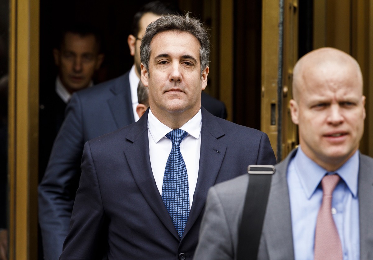 epa06773767 Michael Cohen (C), President Donald Trump's personal attorney leaves following a hearing at United States Federal Court in New York, New York, USA, 30 May 2018. Cohen, who is being in ...