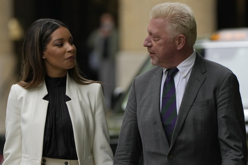 Former Tennis player Boris Becker with Lilian de Carvalho Monteiro as they arrive at Southwark Crown Court for sentencing in London, Friday, April 29, 2022. Becker was found guilty earlier of dodging  ...