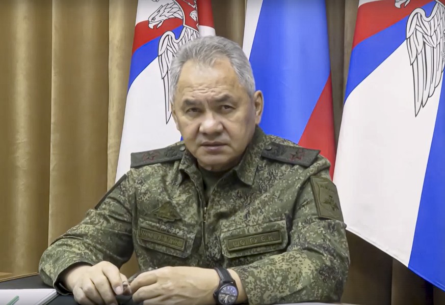 In this handout photo taken from video released by Russian Defense Ministry Press Service on Wednesday, Nov. 9, 2022, Russian Defense Minister Sergei Shoigu speaks during his meeting with the top Russ ...