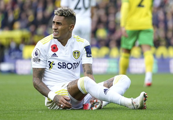 Leeds United's Raphinha appears in pain while on the ground during the Premier League match between Norwich City and Leeds United, at Carrow Road, Norwich, England, Sunday, Oct. 31, 2021. (Joe Giddens/PA via AP)