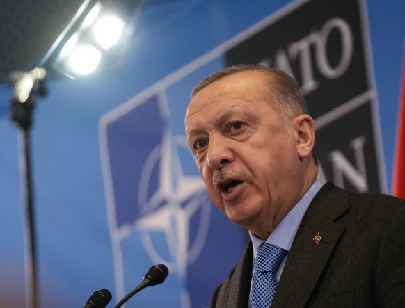 Turkish President Recep Tayyip Erdogan speaks during a media conference after an extraordinary NATO summit at NATO headquarters in Brussels, Thursday, March 24, 2022. As the war in Ukraine grinds into ...