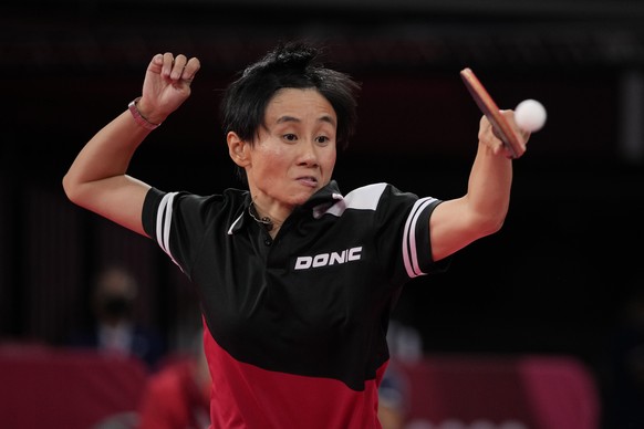 Austria&#039;s Liu Jia competes during the table tennis women&#039;s singles third round match against Adriana Diaz, of Puerto Rico at the 2020 Summer Olympics, Tuesday, July 27, 2021, in Tokyo. (AP P ...